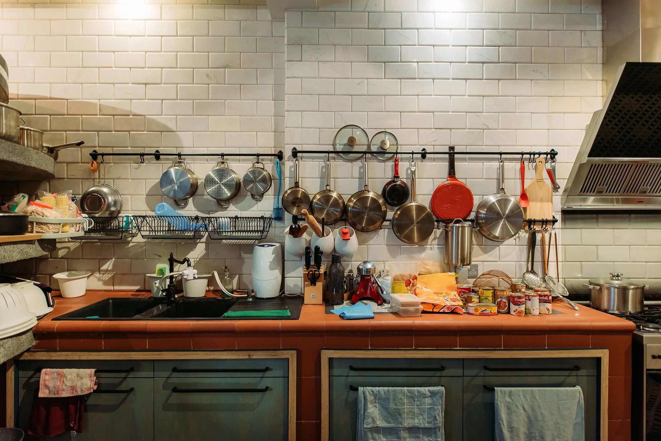 Modern kitchen with sink and cooking utensils