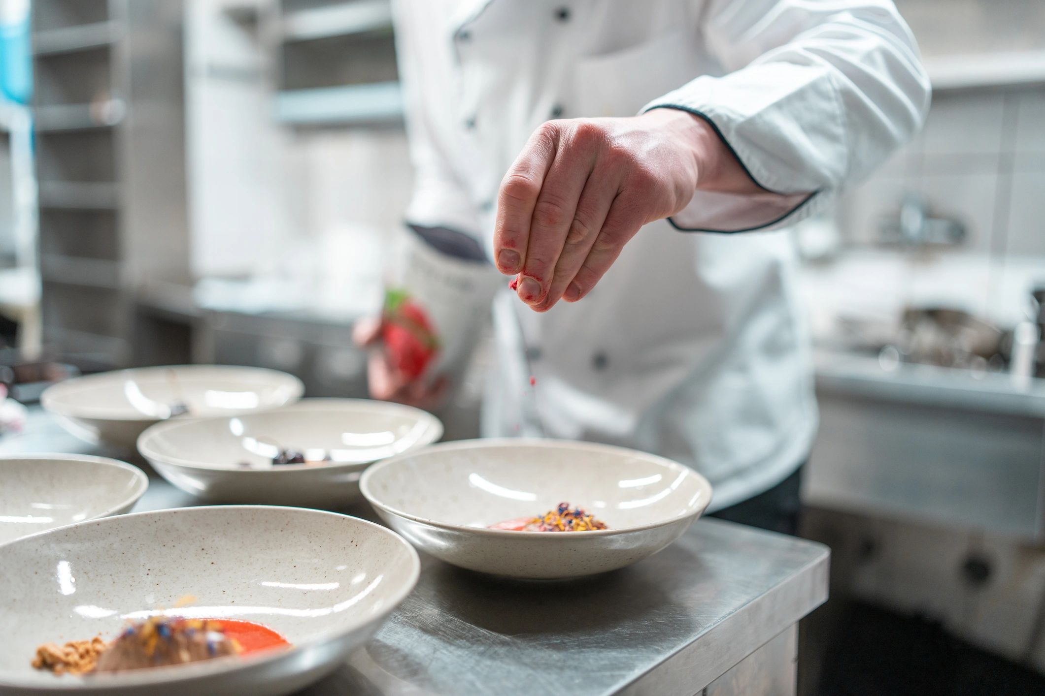 Chef working with kitchen utensils in a modern kitchen