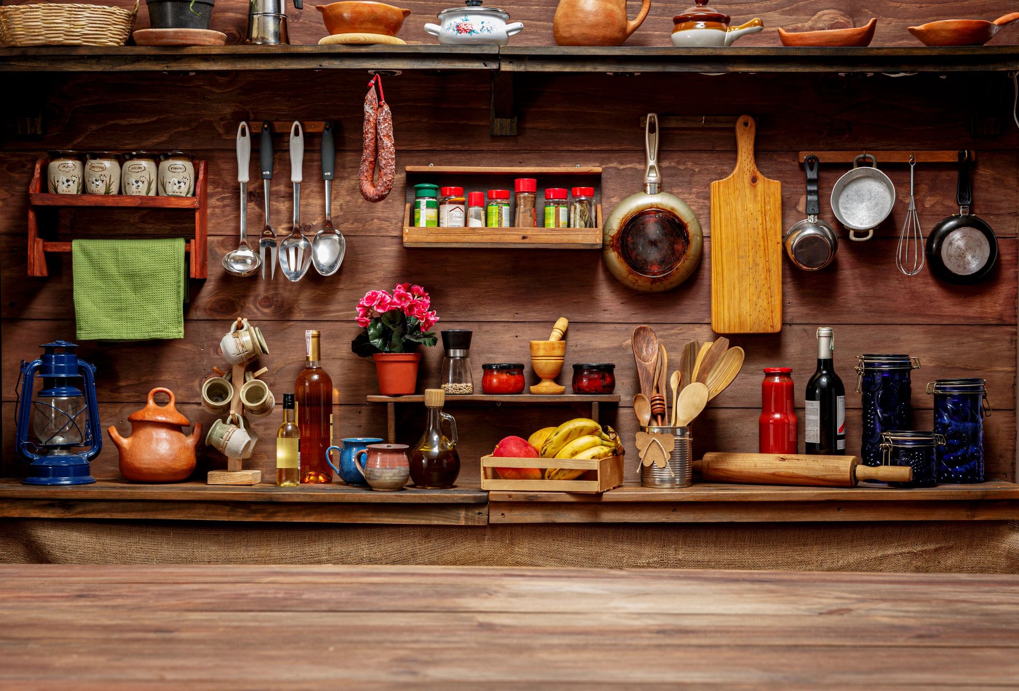 Rustic kitchen with cooking utensils and workspace